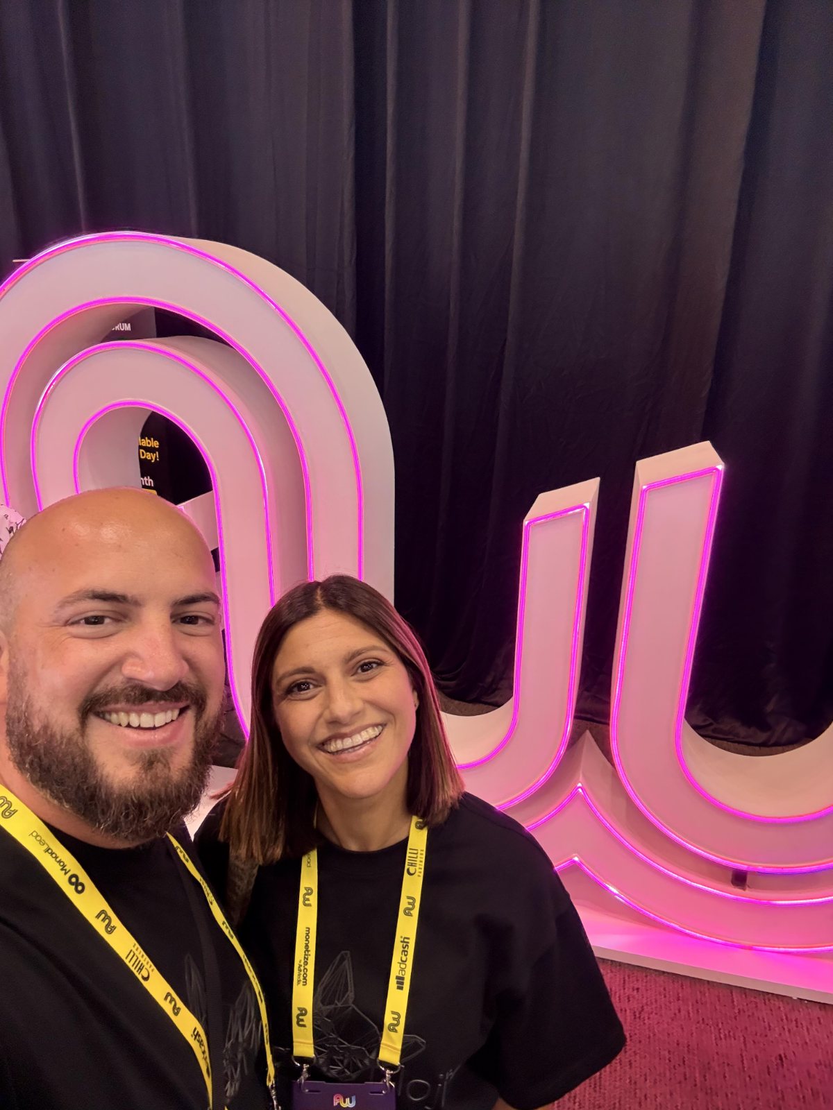 Josh and Sonia smiling together at an event