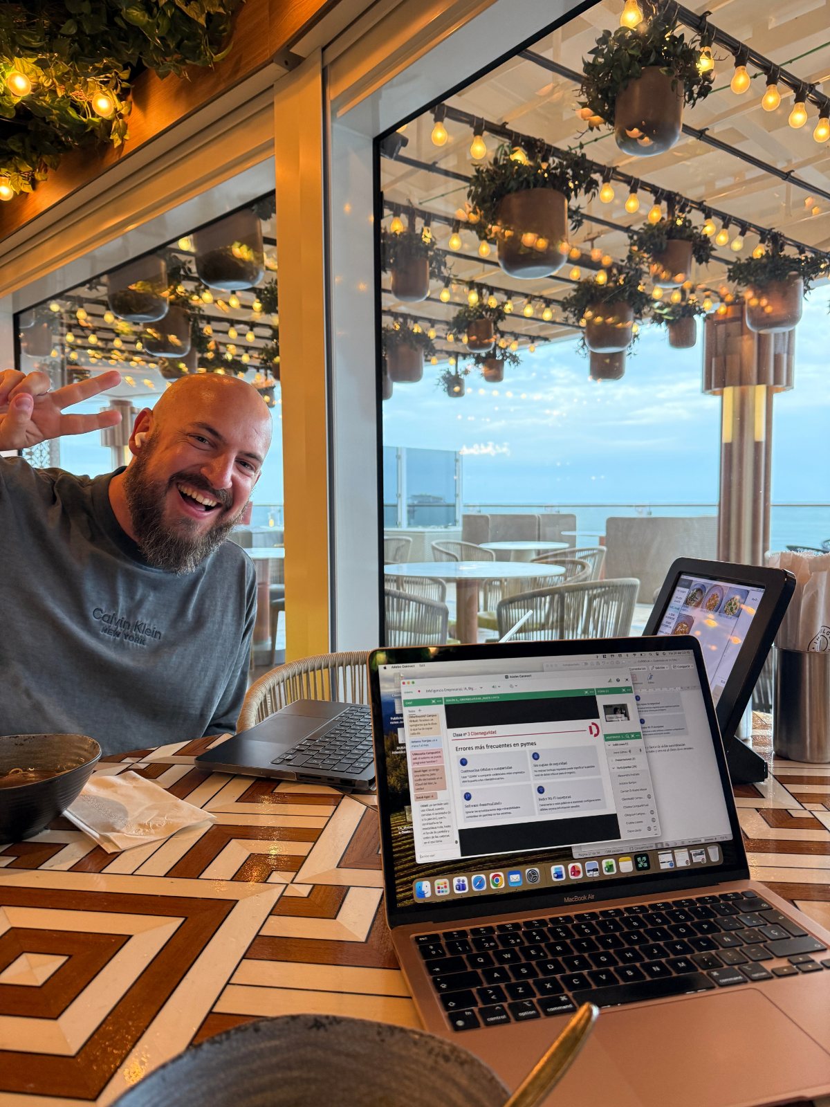Josh working at a laptop at a table