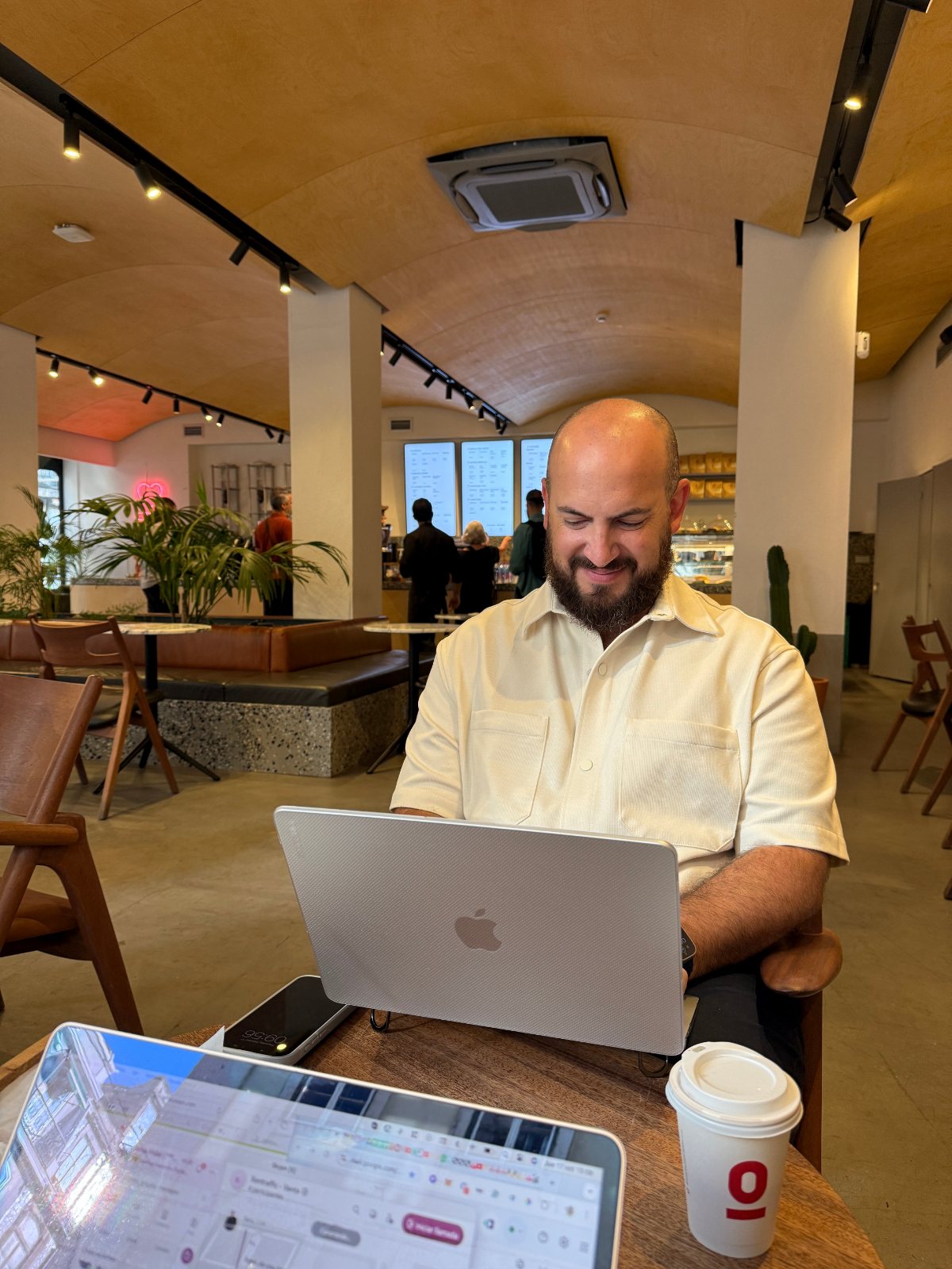 Josh working at a laptop at a table